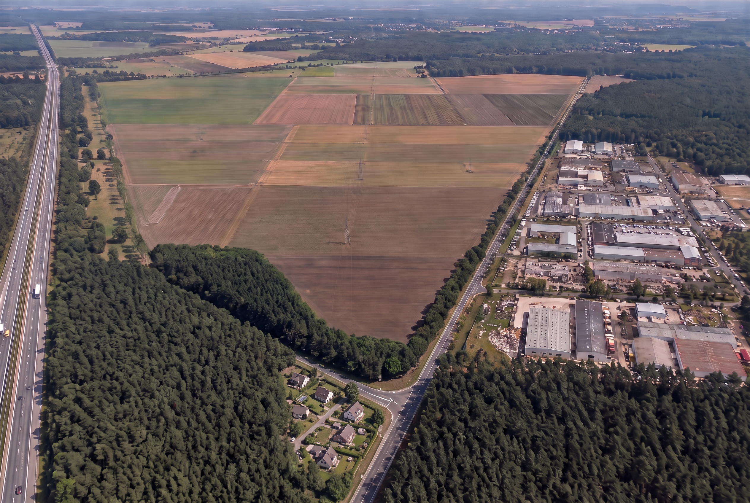 Luftbild der heutigen Situation: landwirtschaftliche Flächen zwischen A13 und bestehendem Gewerbegebiet